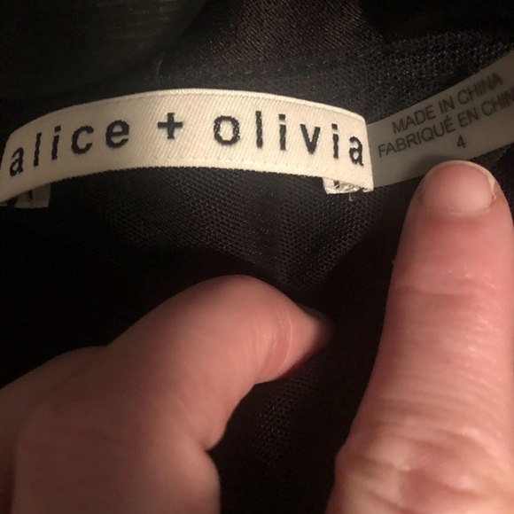 ALICE & Olivia Izzy off the shoulder black ruffle top
Size 4 - Picture 9 of 11